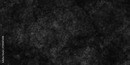 Black textured surface. Old rough wall wide long backdrop.dark background,black panoramic concrete wall background,Black polished sandstone wall texture and seamless background,