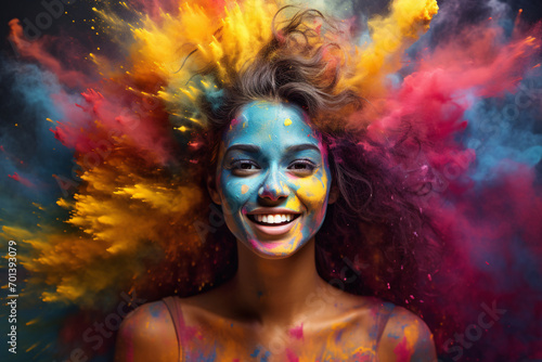 Portrait of a woman in the midst of a color powder explosion