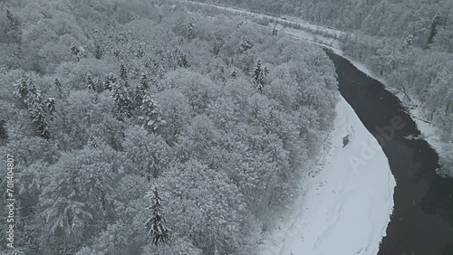Aerial view of the Poprad Landscape Park in Beskid Sadecki on a snowy winter day. photo