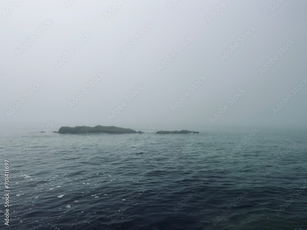 Foggy sea horizon, mist at the sea, mysterious seascape Foggy sea horizon, mist at the sea, mysterious seascape