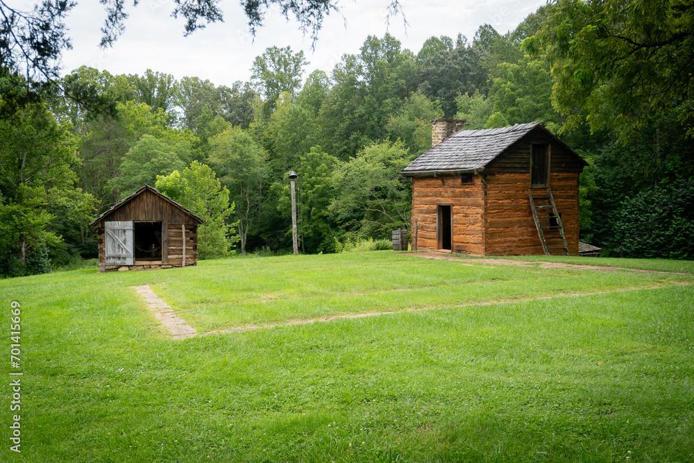 Slave cabin at Booker T. Washington National Monument in rural Virginia. Tobacco farm where educator and leader Booker T. Washington was born into slavery and later freed by Emancipation Proclamation.