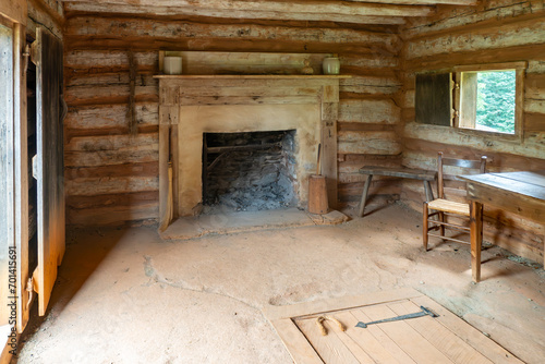 Interior of slave cabin at Booker T Washington National Monument in Virginia. Tobacco farm where educator and leader Booker T Washington was born into slavery and freed by Emancipation Proclamation. photo