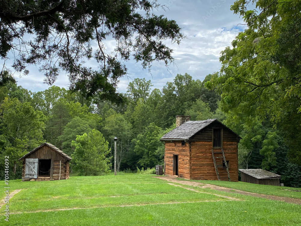 Slave cabin at Booker T. Washington National Monument in rural Virginia. Tobacco farm where educator and leader Booker T. Washington was born into slavery and later freed by Emancipation Proclamation.
