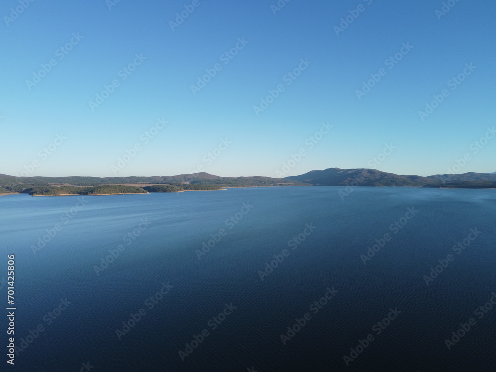 Aerial view of the pristine Iskar reservoir near Sofia, Bulgaria with Balkan mountains in the background