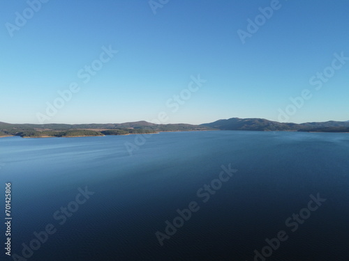 Aerial view of the pristine Iskar reservoir near Sofia, Bulgaria with Balkan mountains in the background