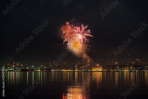 Canvas Print Series of fireworks above large residential area landscape at night