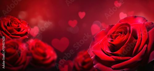 Red roses and hearts isolated on red bokeh background