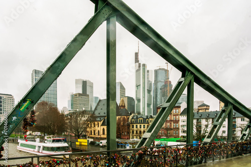 Panorama  of Frankfurt through Iron Footbridge with skyscrapers on Square of  Willy Brandt photo