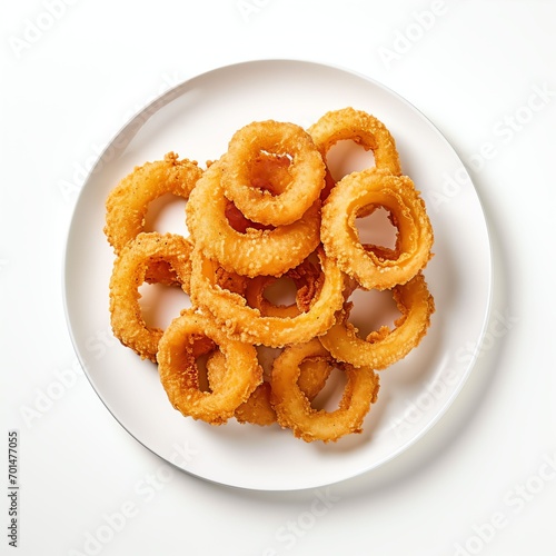 photograph from above, side order of onion rings on a plate on a white background