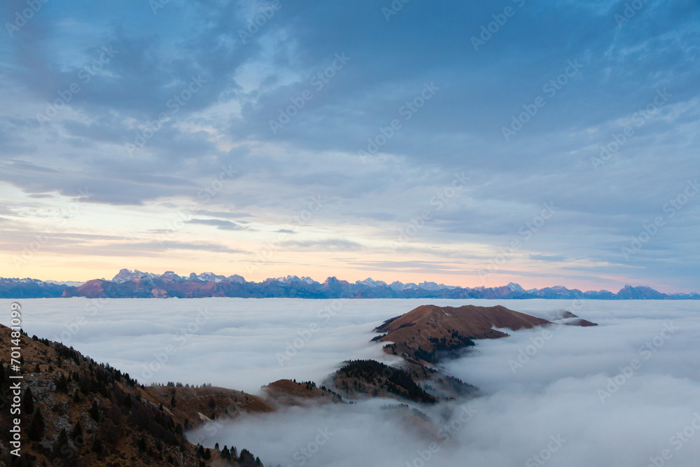 Mountain peaks emerging from the clouds