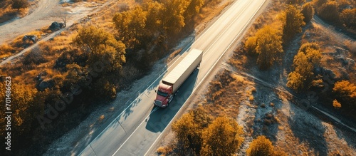 Semi truck on the road from above drone photography. Creative Banner. Copyspace image photo