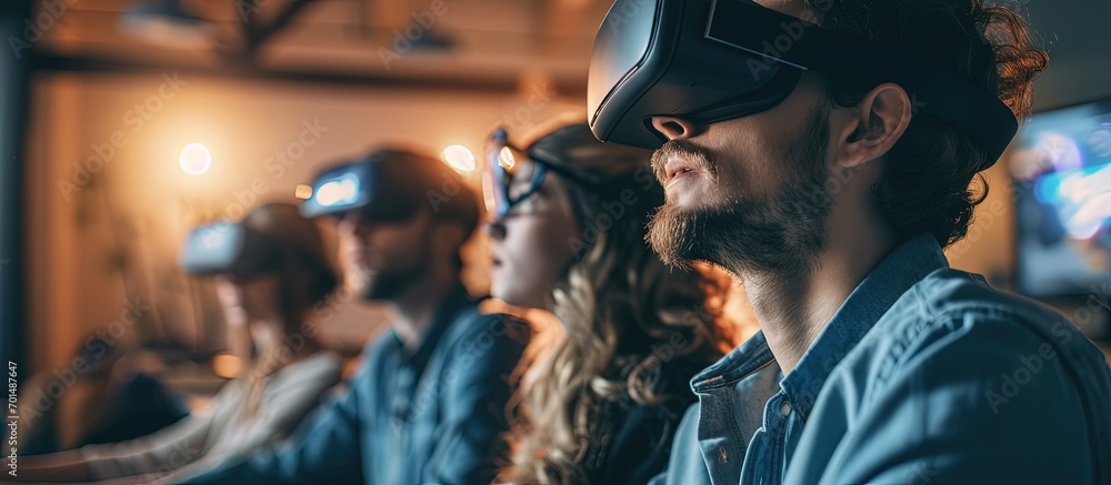 Young group of creatives discusses about new digital projects and digital marketing At the back of the room a group of colleagues interact in the metaverse while wearing vr glasses. Creative Banner Young group of creatives discusses about new digital projects and digital marketing At the back of the room a group of colleagues interact in the metaverse while wearing vr glasses. Creative Banner