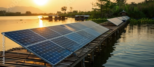 The Floating of Solar panel designed to absorb the sun s rays as a source of energy in aquaculture pond on farmr. Creative Banner. Copyspace image