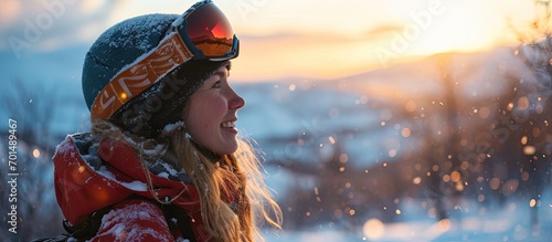 Young happy female skier preparing to ski on snowy slopes of Norwegian mountains in Oppdal Vanglsia ski resort. Creative Banner. Copyspace image photo