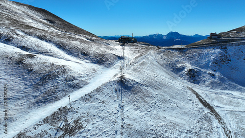 Aerial drone photo of famous ski resort of Velouchi mountain peak as seen at winter, Karpenissi, Evrytania, Greece photo