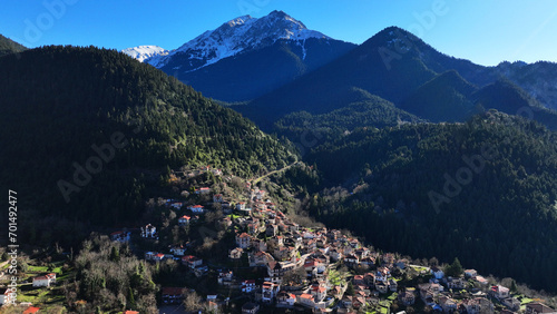 Aerial drone photo of iconic small traditional village of Megalo Chorio built on a mountain slope near famous village of Karpenissi, Evrytania, Greece photo