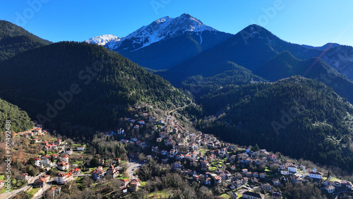 Aerial drone photo of iconic small traditional village of Megalo Chorio built on a mountain slope near famous village of Karpenissi, Evrytania, Greece © aerial-drone