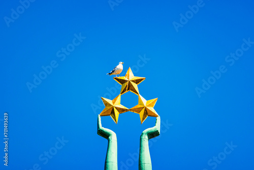 Freedom Monument known as Milda, located in the centre of Riga, the capital of Latvia, Free Space for Text photo