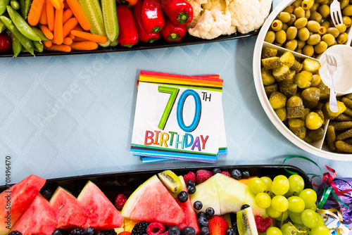 Birthday Party Food Colorful Fruit and Vegetable Platters. Milestone 70th Birthday Event Celebration Background