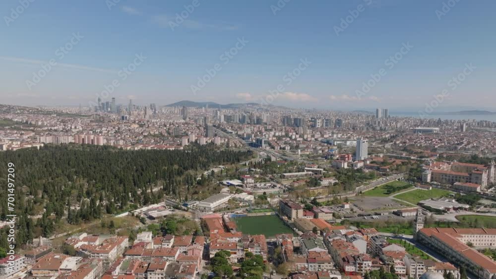 Aerial panoramic view of metropolis on sunny day. Various residential buildings in residential boroughs and modern high rise towers in distance. Istanbul, Turkey Aerial panoramic view of metropolis on sunny day. Various residential buildings in residential boroughs and modern high rise towers in distance. Istanbul, Turkey