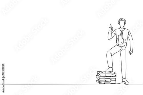 Single one line drawing businessman stands with thumbs up pose and steps on stack of banknotes with one of foot. Amazing feeling. Always make a profit. Continuous line design graphic illustration