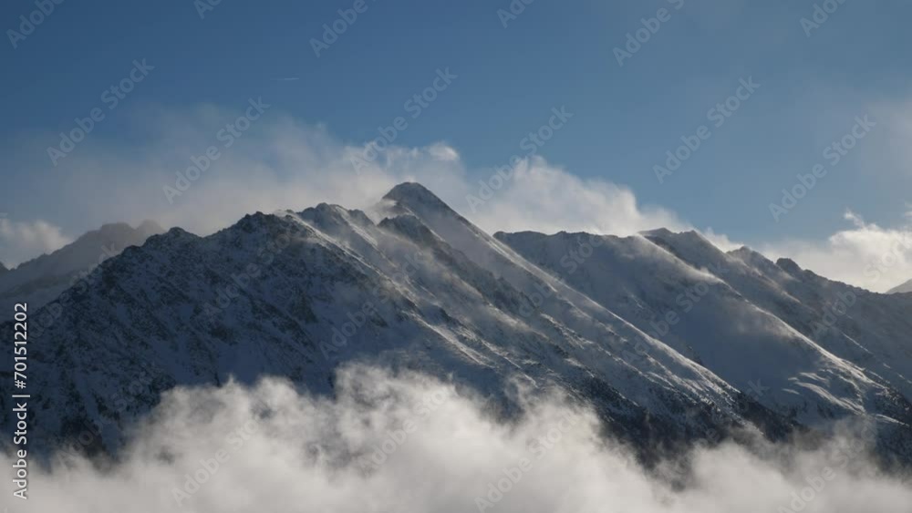 mountains arising from cloud, sunny blue sky with mist mountains arising from cloud, sunny blue sky with mist