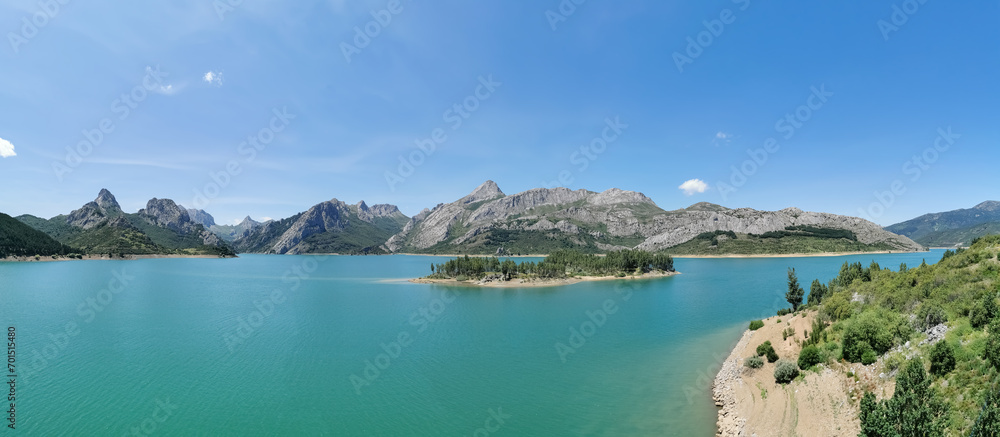 Panoramic view at the Riaño Reservoir, located on Picos de Europa or Peaks of Europe, a mountain range forming part of the Cantabrian Mountains in northern Spain