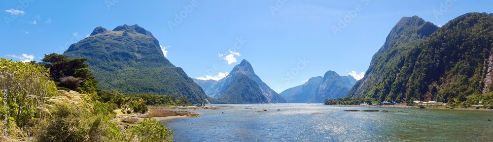 New Zealand fiord blue water with rocks 