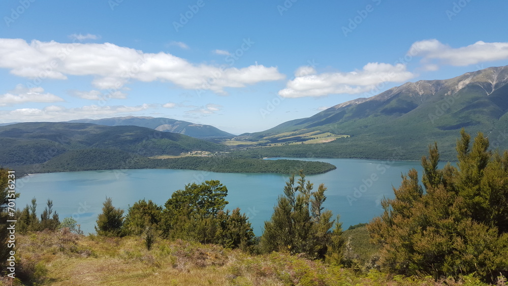 New Zealand lake landscape blue with. mountains in the back