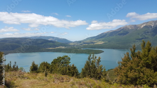 Fototapeta Naklejka Na Ścianę i Meble -  New Zealand lake landscape blue with. mountains in the back