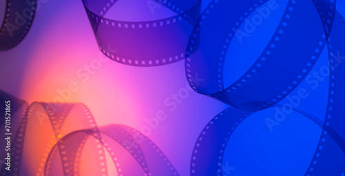 multicolored cinema background with film strip