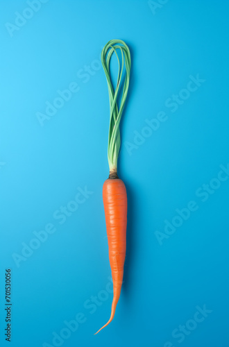 Carrot with leaf as a clasp.Minimal creative food concept.Flat lay,top view,copy space.Generative AI