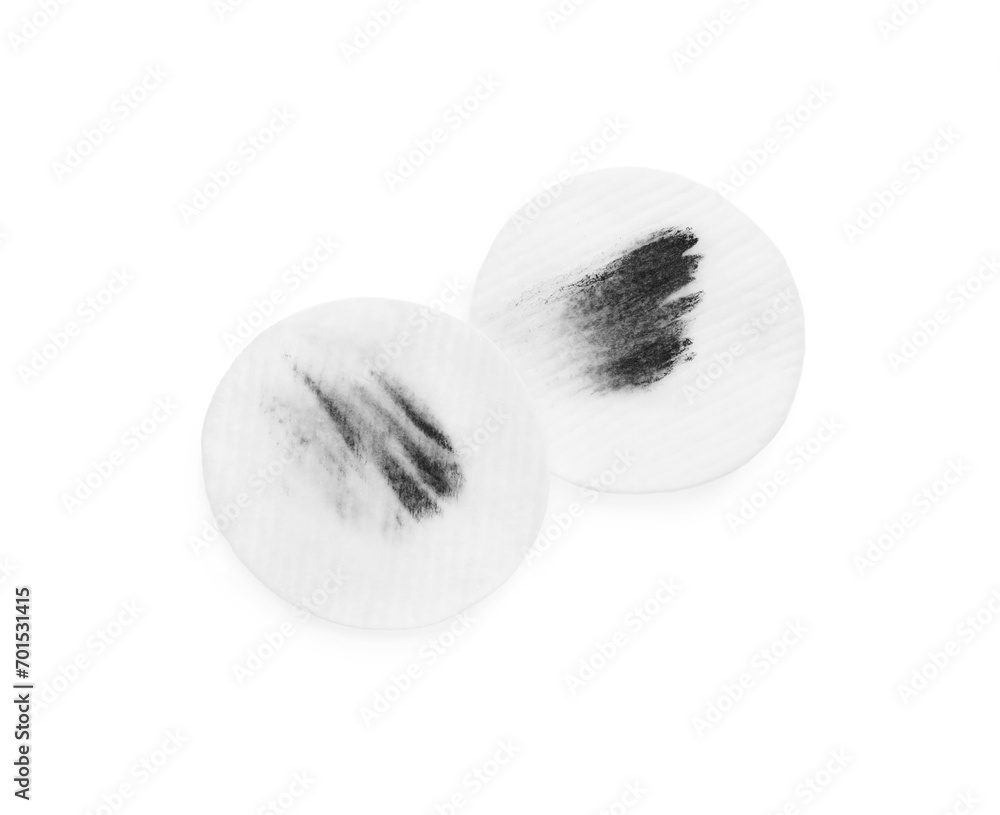 Dirty cotton pads after removing makeup on white background, flat lay Dirty cotton pads after removing makeup on white background, flat lay