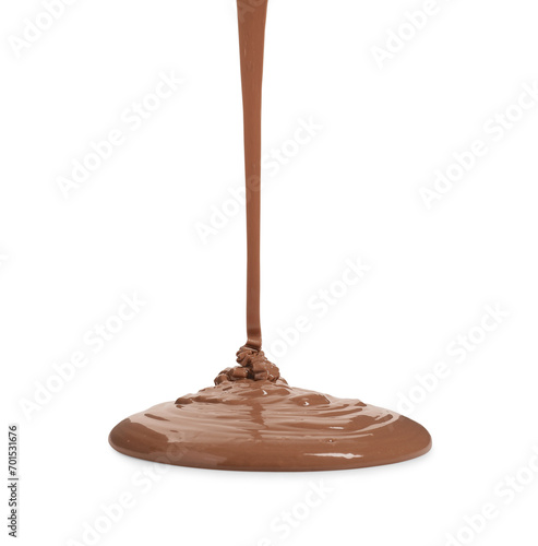 Pouring tasty melted milk chocolate isolated on white