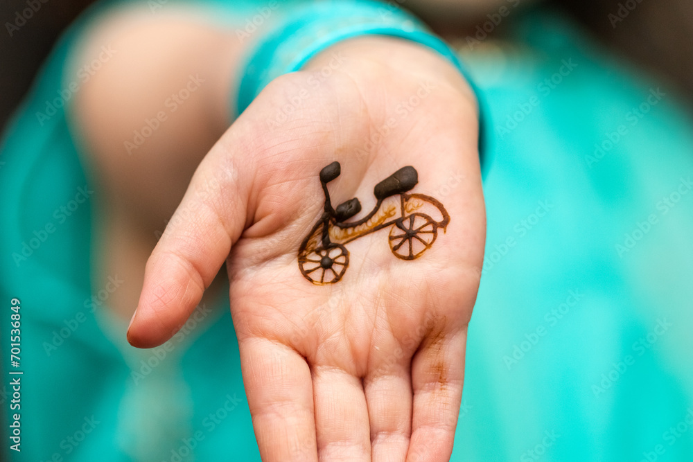 Obraz premium Bike henna tattoo on child's hand. Henna Art.