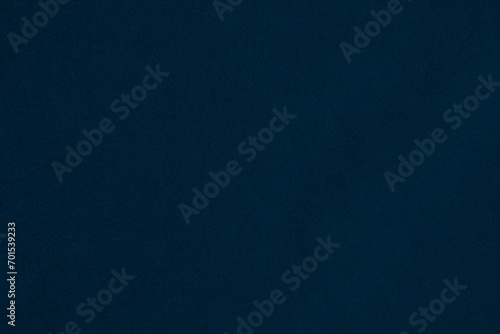 Dark blue velvet fabric texture used as background. silk color denim fabric background of soft and smooth textile material. crushed velvet .luxury navy blue dark tone for silk. photo