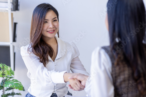 Business woman offer and give hand for handshake in office. Successful job interview. Apply for loan in bank. Salesman, bank worker or lawyer shake for deal, agreement or sale. Increase of salary. 