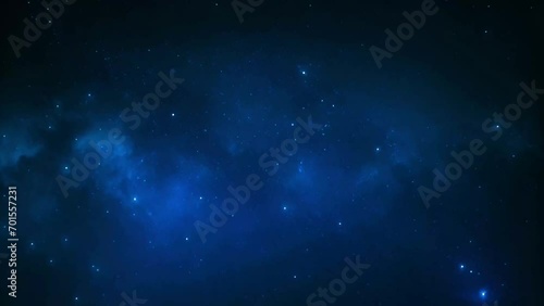 深い青色の宇宙に浮かぶ無数の星々がきらめく様子の4K動画GenerativeAI photo