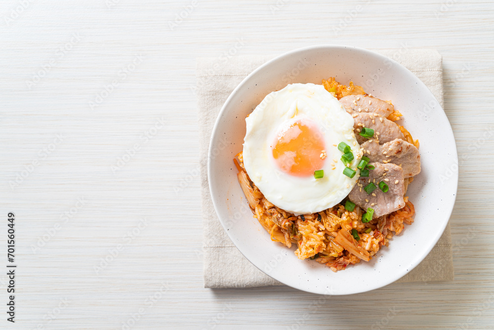 Kimchi fried rice with fried egg and pork Kimchi fried rice with fried egg and pork