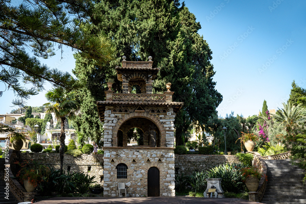 Villa comunale garden in Taormina. City park with landscaped gardens and picturesque views in Taormina, Sicily in Italy Villa comunale garden in Taormina. City park with landscaped gardens and picturesque views in Taormina, Sicily in Italy