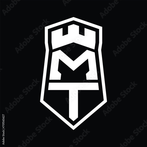 MT Letter Logo monogram hexagon shield shape up and down with crown castle isolated style design © F4KEarts