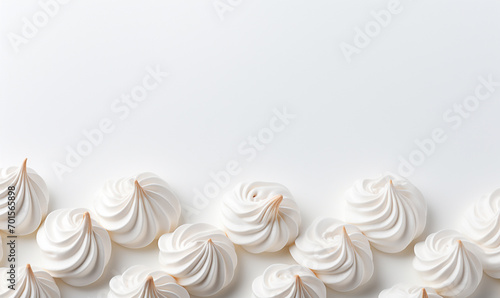 French vanilla Meringues arrangement on white background. photo