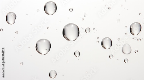 A close up of a wave of water with bubbles on a white background.
