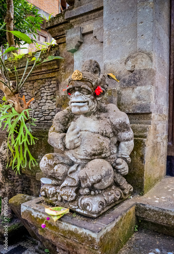 art ancient god statues with smile at Bali