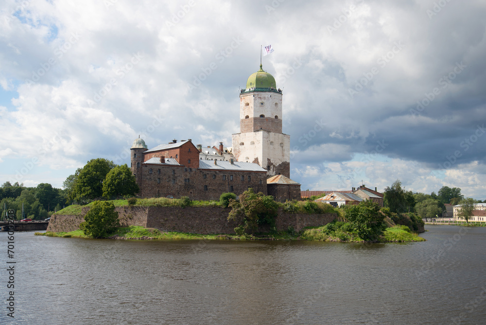 Vyborg castle under a large cloudy sky day in august