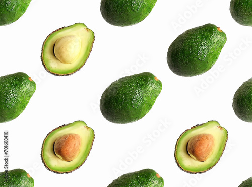 Flat lay composition with ripe avocados and leaves on white background, top view