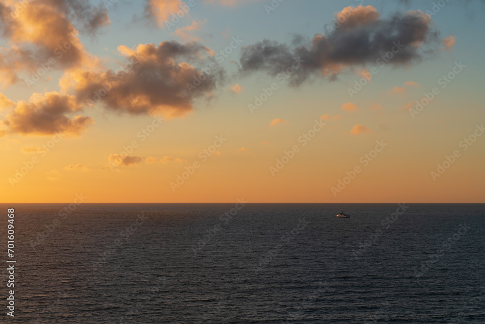 Pink sunset sky with clouds over the Baltic Sea, Svetlogorsk, Kaliningrad region, Russia Pink sunset sky with clouds over the Baltic Sea, Svetlogorsk, Kaliningrad region, Russia