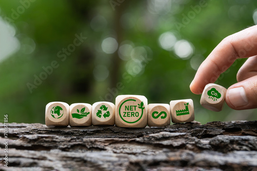 Net zero icon and carbon neutral concept, 2050 goal, long term climate neutral strategy. Wooden block with green icon Net zero greenhouse gas emissions Climate.
