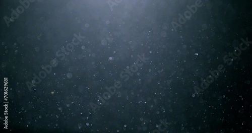3D rendering bubble spheres randomly floating in the water for composite. Close up and slow-motion movement.