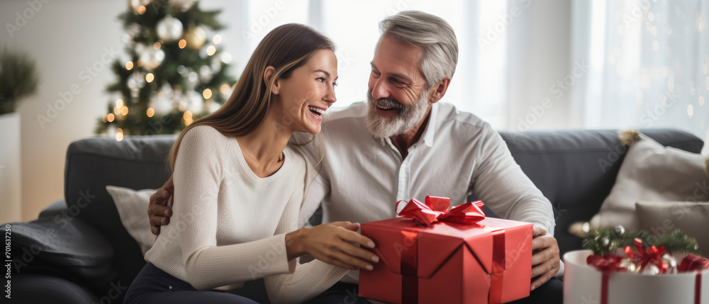 Family enjoy celebration with new year present gift box. Spread love and winter present concept. Family enjoy celebration with new year present gift box. Spread love and winter present concept.